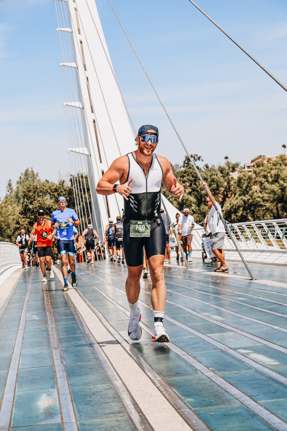 Mitchell running the Sundial Bridge at IRONMAN 70.3 Northern California