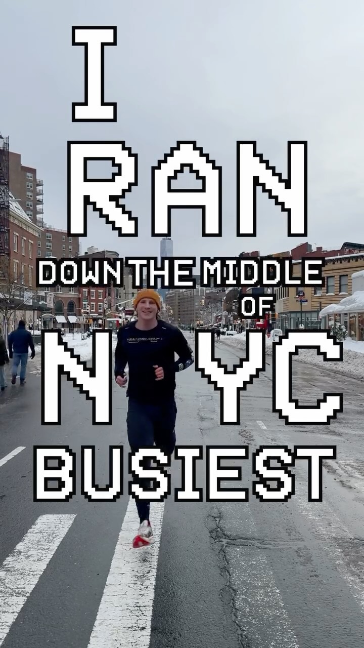 Running down the middle of a snowy NYC street